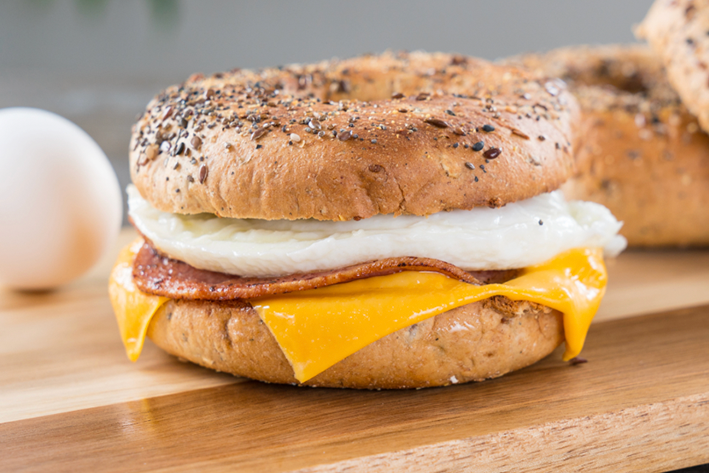 bagel breakfast sandwich with egg cheese and meat